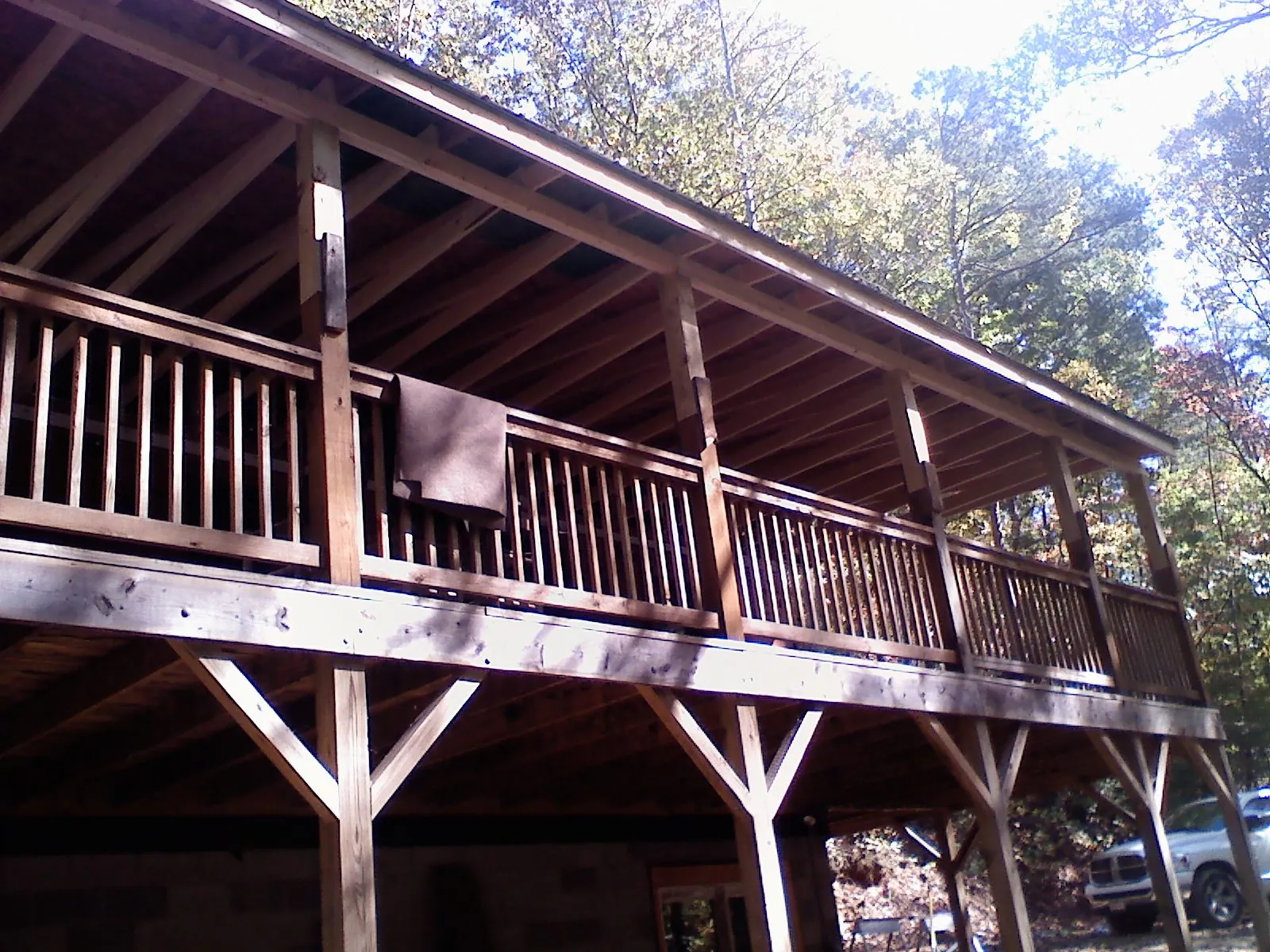 Timber framing under a new elevated porch and deck — Roof Leak Repair in Houghton by Roofing Brothers